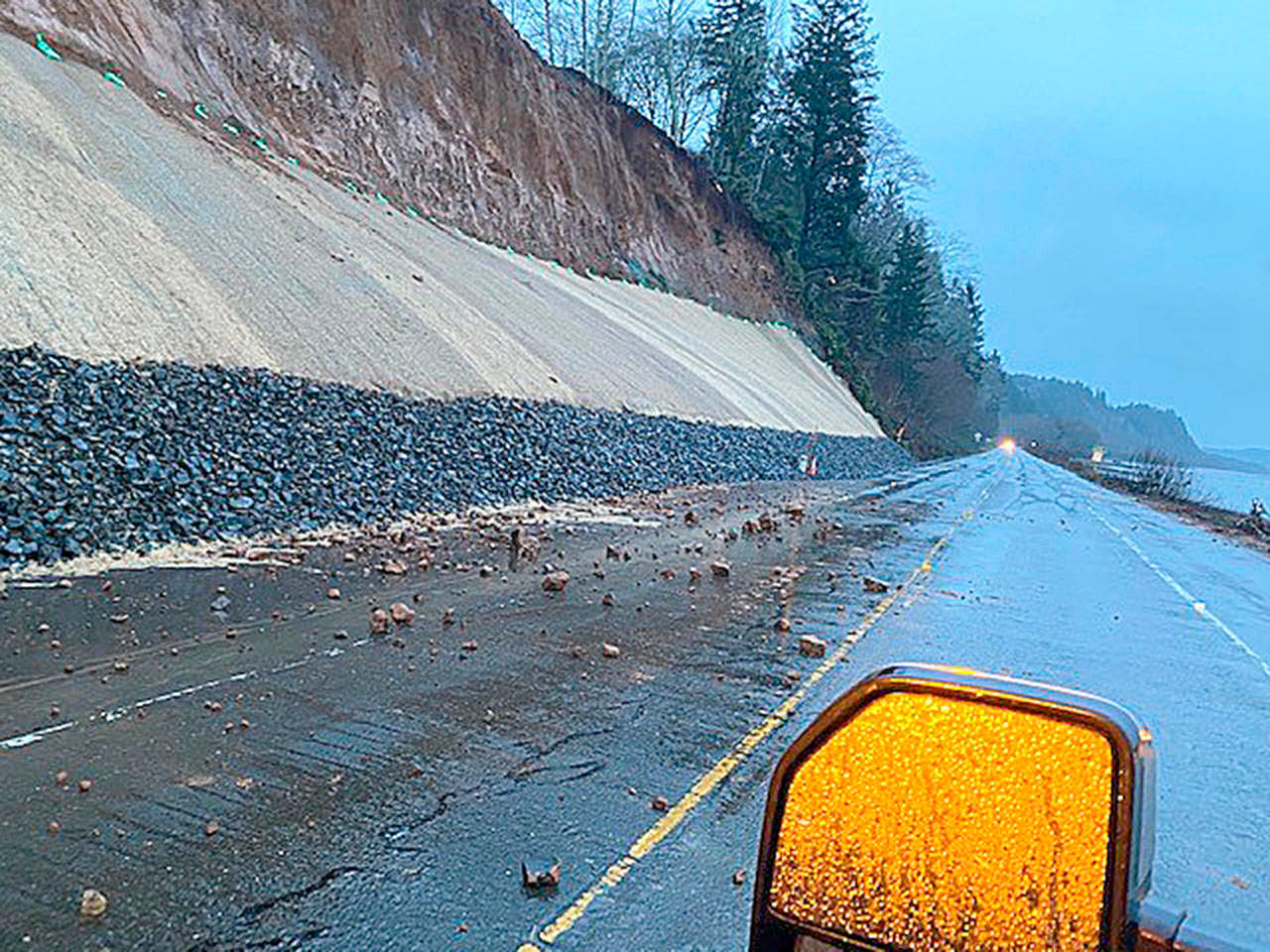 COURTESY STATE DEPARTMENT OF TRANSPORTATION 
Crews discovered this rockfall on State Route 109 just west of Hoquiam Sunday morning and immediately closed the roadway, just hours after it had reopened after a Jan. 17 slide.