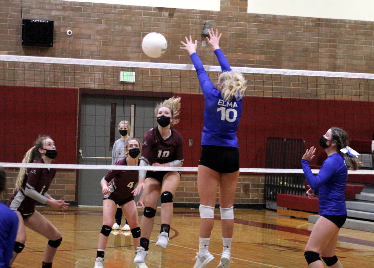 Montesano outside hitter Jessica Stanfield (10, left) smashes a kill past the block of Elma’s Sarah Bridge during Monte’s 3-1 victory on Tuesday at Montesano High School. Stanfield tallied a game-high 16 kills in the contest. (Ryan Sparks | The Daily World)