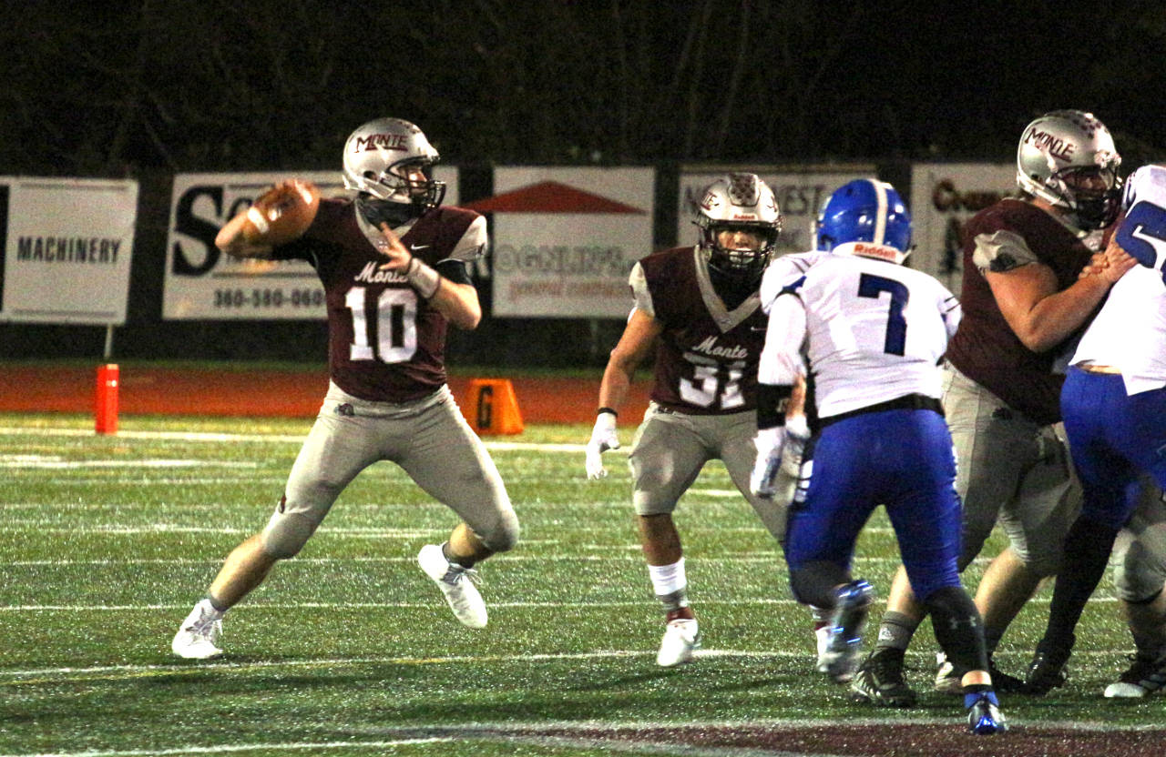 Montesano quarterback Trace Ridgway drops back to pass during the first half of the Bulldogs’ 41-0 win over Elma on Friday at Montesano High School. (Ryan Sparks | The Daily World)