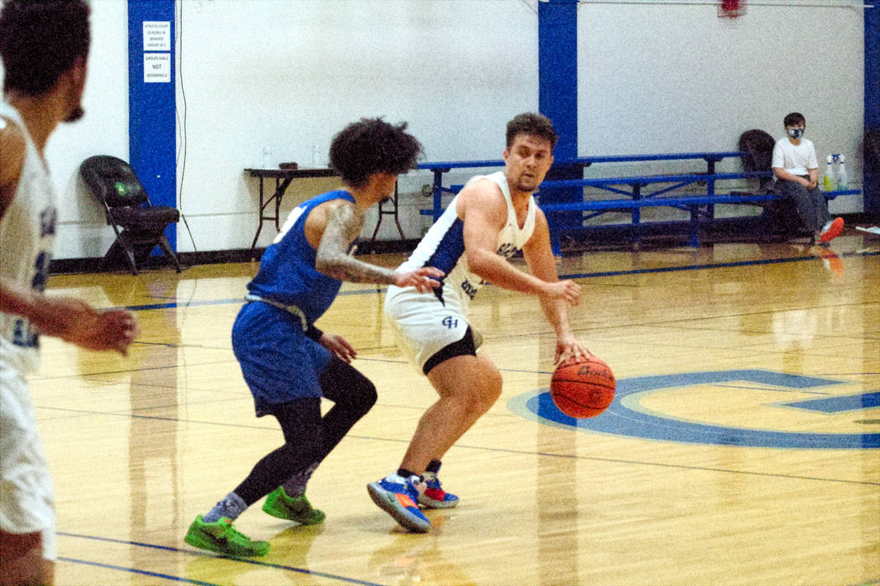 RYAN SPARKS | THE DAILY WORLD Grays Harbor point guard Sammy Legleu, right, scored 17 points off the bench to lead the Chokers to a 79-75 victory over Centralia on Tuesday in Aberdeen.