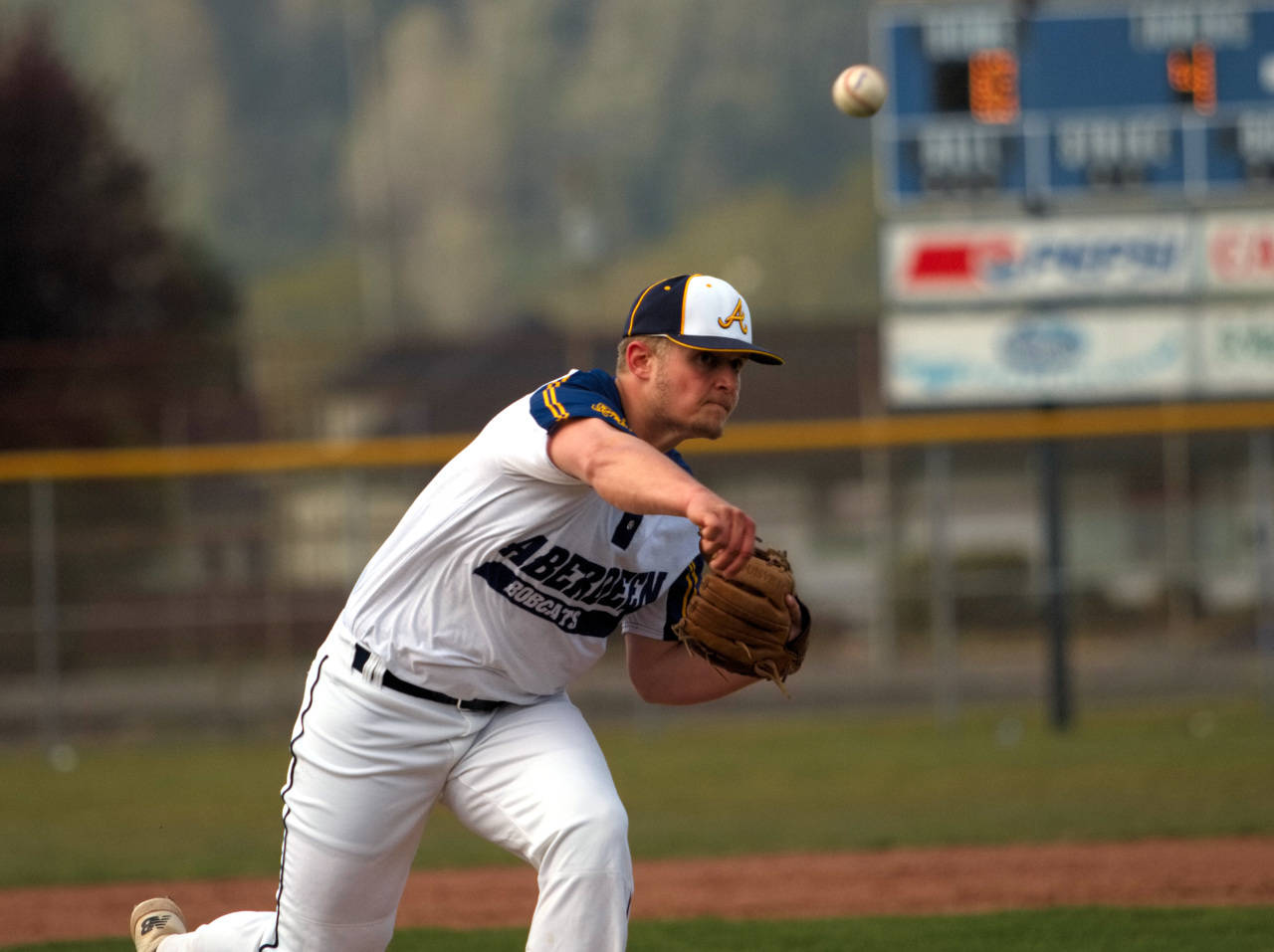 RYAN SPARKS | THE DAILY WORLD Aberdeen pitcher Eli Brown hurls a pitch during the Bobcats’ 14-2 victory on Wednesday in Aberdeen. Brown allowed one earned run and struck out seven in to earn a complete-game victory.