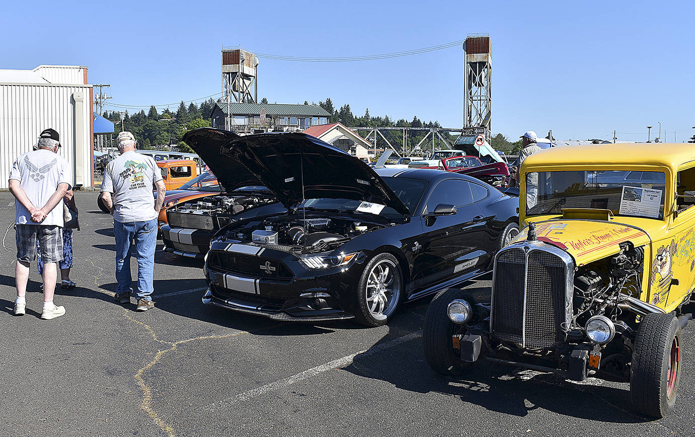 DAN HAMMOCK | THE DAILY WORLD 
A little something for everyone who loves cars was at the Hoquiam Pushrods River Run Revival car show on Levee Street Saturday. In the foreground is a 1932 Pontiac registered to David Rowe of South Bend. It’s sitting next to a newer model Shelby.