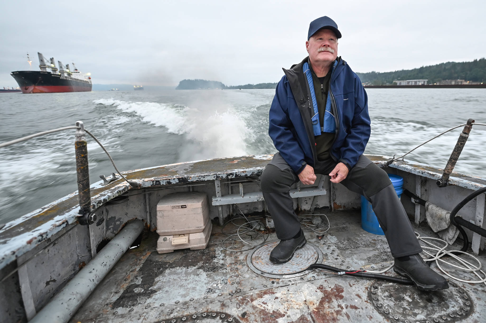 Courtesy of Coast Guard District 13 
Westport South Beach Historical Society Executive Director John Shaw was aboard one of two historic Coast Guard vessels donated to the historical society as they made their way from the Columbia River to the Westport Marina on Aug. 16, 2021.