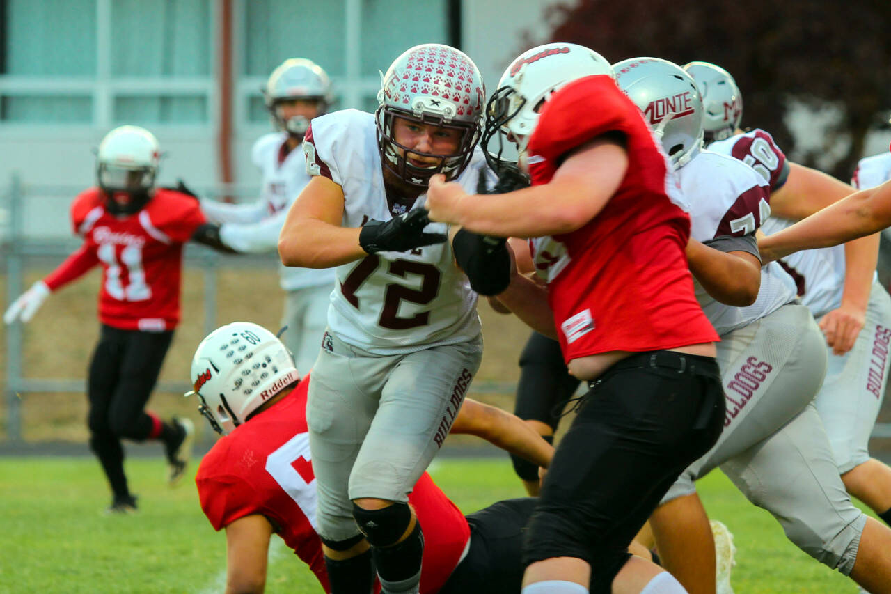 PHOTO BY SHAWN DONNELLY Montesano lineman John Southard (72) blocks against Columbia-White Salmon on Sept. 16. Montesano will face 2B powerhouse Napavine on Friday after COVID concerns caused the cancelation of the Bulldogs game against La Center.