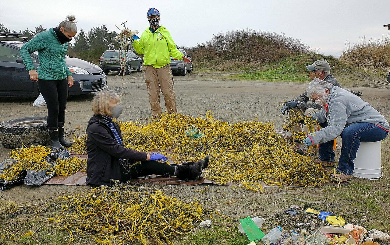 Quite a day of beach cleanup, almost 17,000 yellow ropes found off Warrenton Cannery Road Jan. 16., along with other assorted refuse. (Courtesy Lee First and John Shaw)