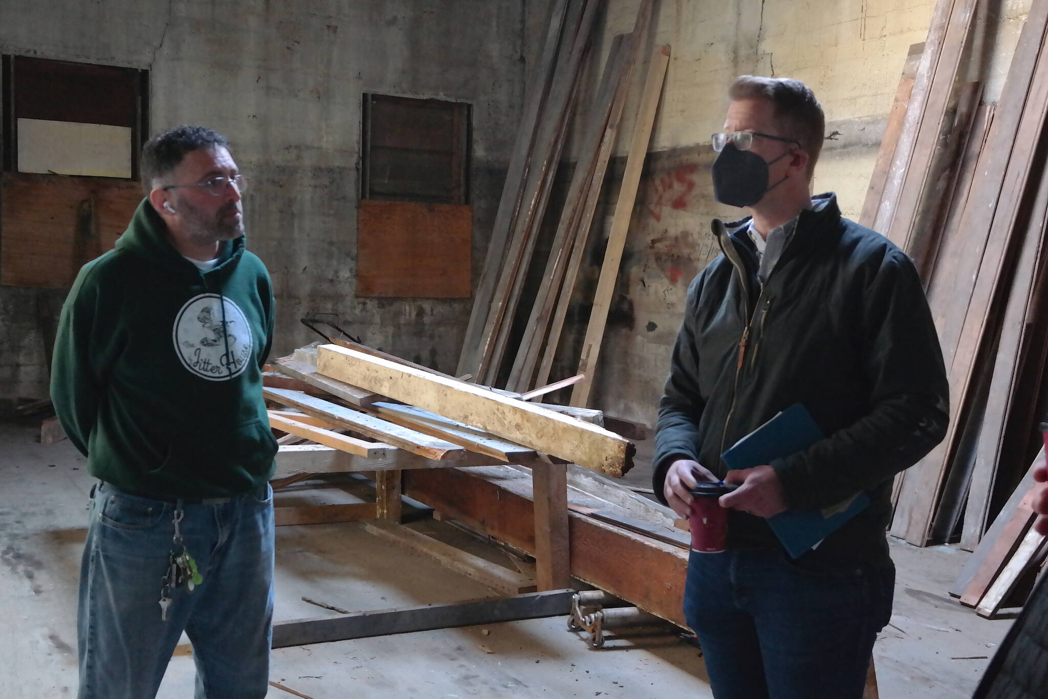 Congressman Derek Kilmer (D-Gig Harbor) tours the early-stage renovations of the former La Vogue Department Store building with The Jitter House owner Sam Nazario on Feb. 11, 2022. The building was purchased last year by Harbor Strong LLC, a group that includes Nazario and five other investors. Erika Gebhardt I The Daily World