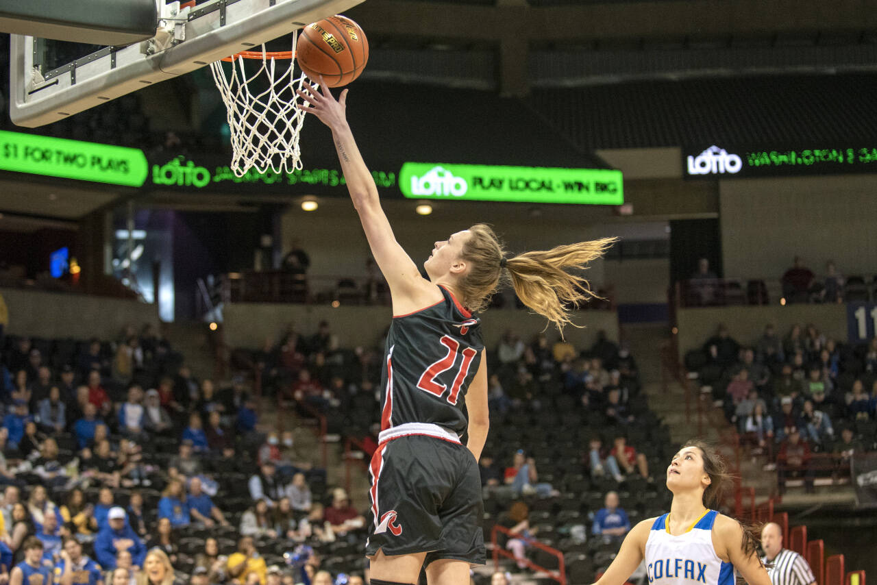 ERIC TRENT | THE CHRONICLE Raymond’s Kyra Gardner scores during the Seagulls’ 67-34 loss to Colfax in the 2B State quarterfinal round on Thursday, March 3, 2022 at the Spokane Arena. Gardner scored 21 points to surpass Ronalda Dunn as the school’s all-time leading scorer.