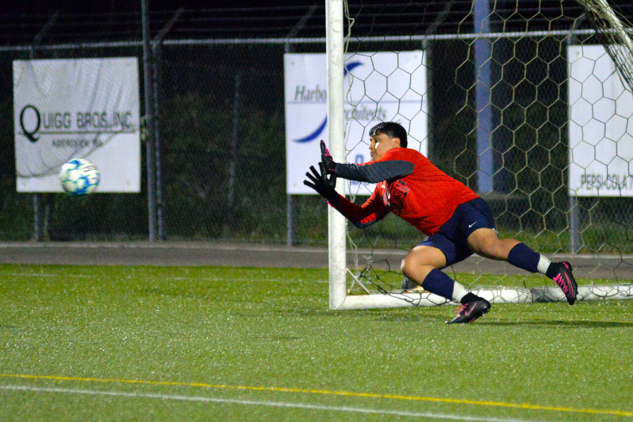 RYAN SPARKS | THE DAILY WORLD Aberdeen goal keeper Antonio Granados dives to stop an attempt in a penalty-kick shootout during Aberdeen’s 2-1 victory over Rochester on Friday at Stewart Field in Aberdeen.