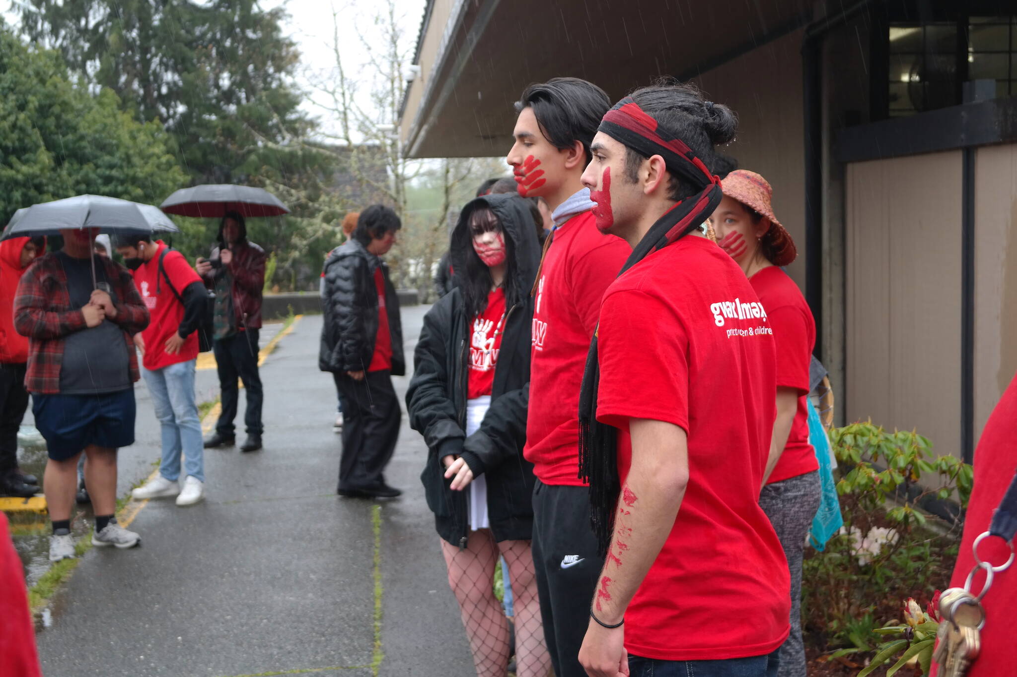 HHS sophomore Tyson Reece (front right) and junior Anthony Walkins used social media to spread the word about the National Day of Awareness for MMIWG and Hoquiam's awareness walk. The idea came from a small group of students in the Native Education program, but quickly gained traction and is on its way to becoming an annual event at HHS. Erika Gebhardt I The Daily World