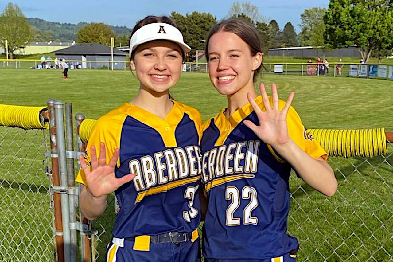 SUBMITTED PHOTO Aberdeen’s Laynie Yakovich (33) drove in five runs and Aili Scott (22) scored five runs in the Bobcats’ 11-3 victory over Mark Morris in the 2A District 4 pigtail game on Tuesday in Longview.