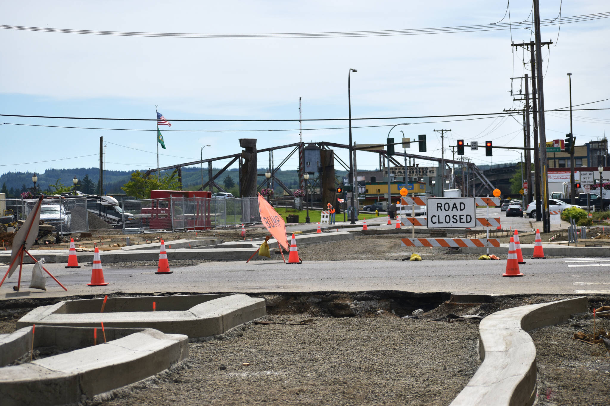 The view from outside Twin Star Credit Union — 416 E. Market St., — shows part of the roundabout construction site, the closure of F Street just south of East Market Street, and the changing changing terrain from the work involved in order to build the roundabout. Nick Bird, city engineer for the City of Aberdeen, warns pedestrians to avoid walking through the construction zone, citing concerns for their safety. (Matthew N. Wells | The Daily World)