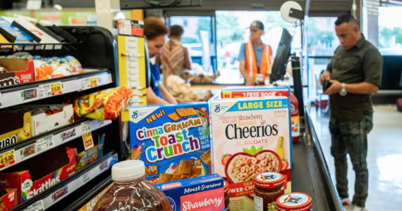 Brandon Bell | Getty Images | TNS | File Photo 
A cashier processes a customer’s order in a Kroger grocery store on July 15, 2022, in Houston.