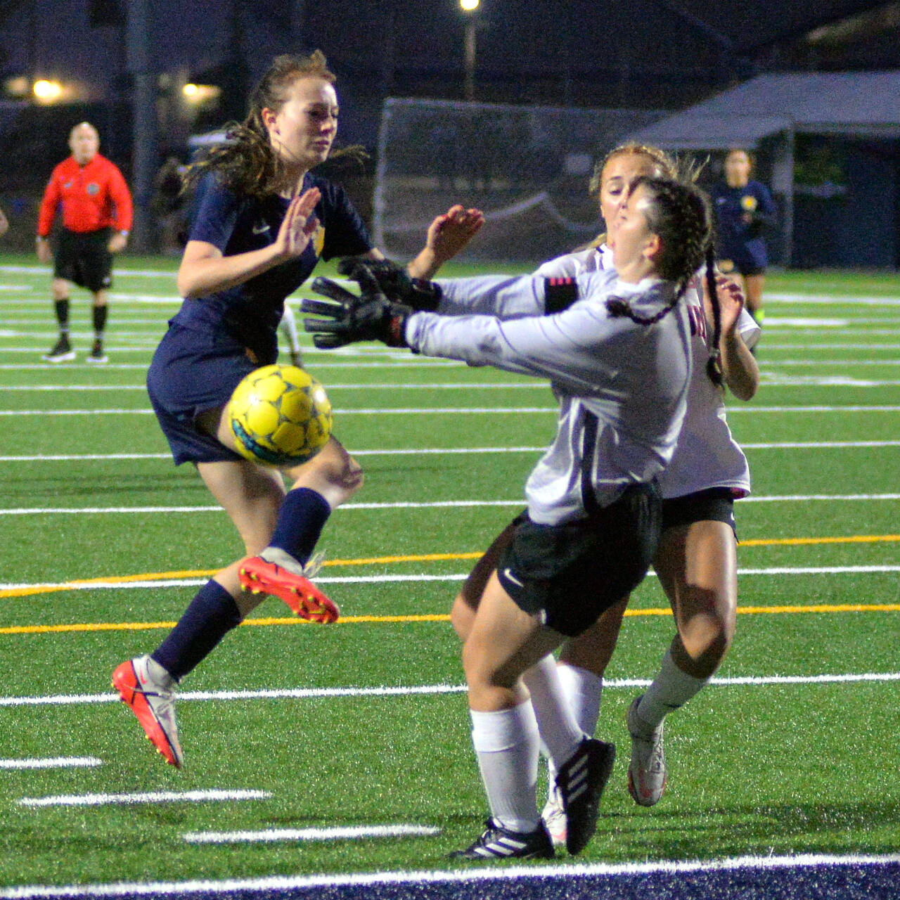 RYAN SPARKS | THE DAILY WORLD Aberdeen forward Annie Troeh, left, collides with Shelton goal keeper Taylin Vandyke during the Bobcats’ 3-0 win on Thursday, Sept. 29, 2022 at Stewart Field in Aberdeen.