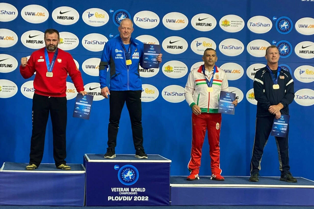 SUBMITTED PHOTO 
Team USA’s Kevin Pine, right, won a gold and bronze (pictured) medals at the 2022 Veteran Worlds championships Oct. 4-9 in Plovdiv, Bulgaria. Also pictured are gold medalist Martin Dalsbotten (Norway), second from left; silver medalist Jerzy Sekura (Poland), left; and co-bronze medalist Laszlo Angela (Hungary), second from right.