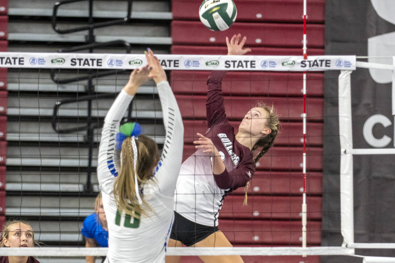 PHOTO BY ERIC TRENT
 Montesano’s Ashlyn Devereaux (3) spikes against Lakeside of Nine Mile Falls during a loser-out match in the 1A State Volleyball Tournament at the Yakima Valley SunDome on Friday.