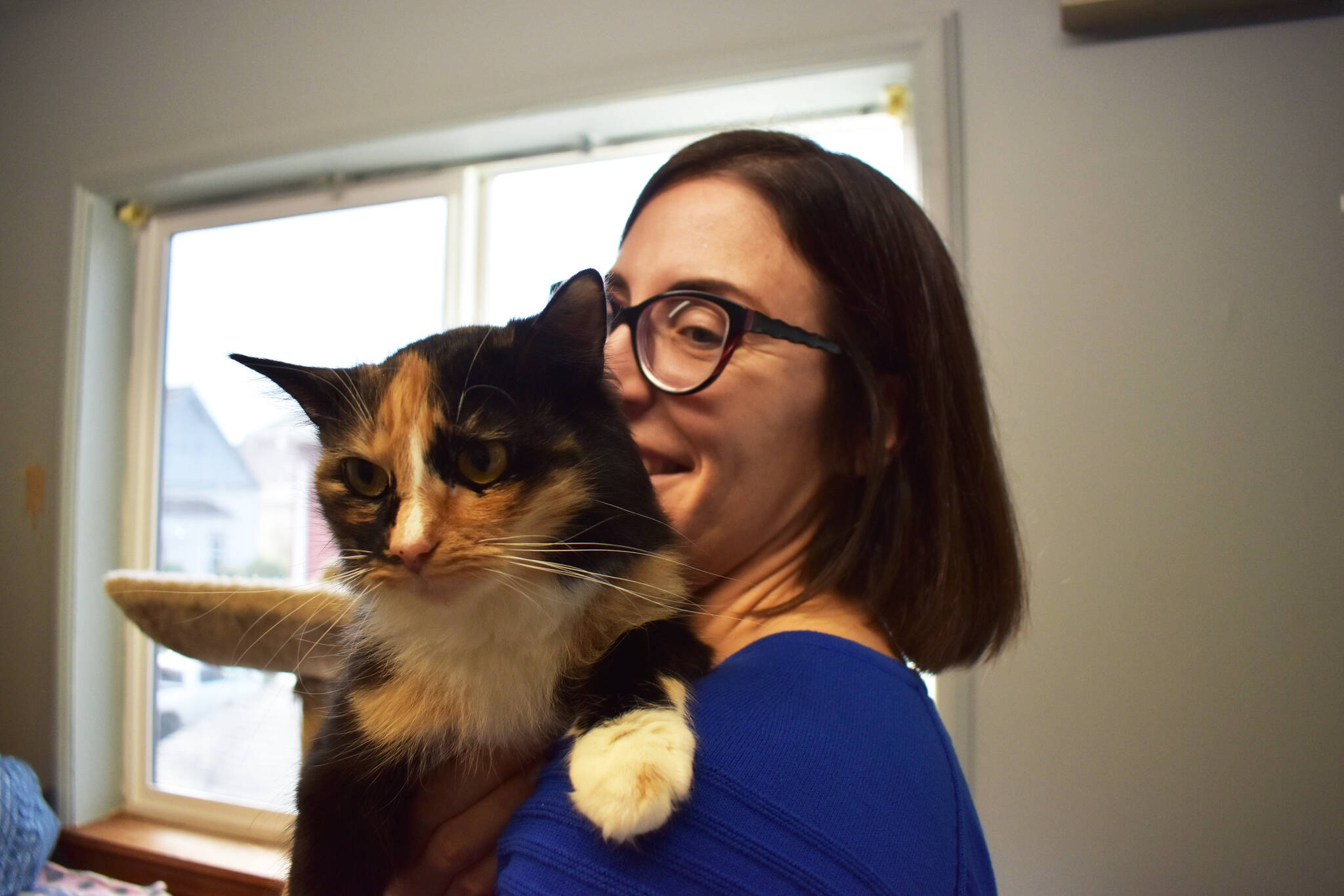 Matthew N. Wells / The Daily World
Anna Boeche, executive director at PAWS of Grays Harbor, holds Medusa, a 1-year-old calico domestic long-haired cat on Wednesday at PAWS of Grays Harbor. The animal shelter is hosting a National Adoption Weekend that is 11 a.m. to 4 p.m. on Friday and Saturday, with appointments on Sunday.