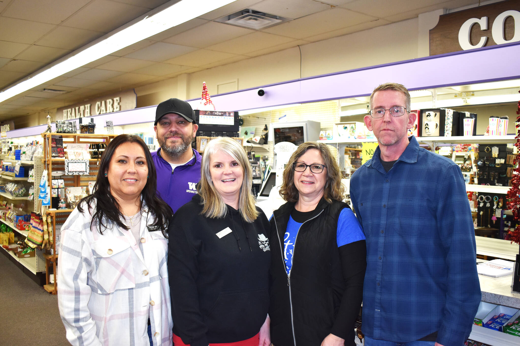 Matthew N. Wells / The Daily World
Patrick O’Donnell, owner of City Center Drug Co., — 108 E. Wishkah St., in Aberdeen — stands on the right with his staff inside the pharmacy. The store will be in operation through end of business on Dec. 27. Then, starting on Dec. 28, the prescription records will transfer to Rite Aid. People can either use Rite Aid, or they can transfer to another pharmacy if they so choose. O’Donnell, who has owned the pharmacy since the mid-2000s, would rather keep the pharmacy open, but after trying to keep it open, he feels he has no other choice but to close it.