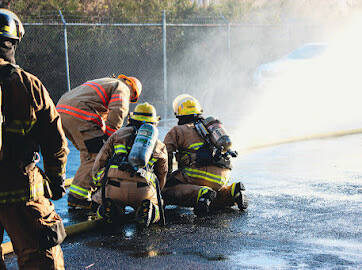 Students take part in a previous fire academy held in Grays Harbor by local fire departments. (Courtesy photo / South Beach Regional Fire Authority)