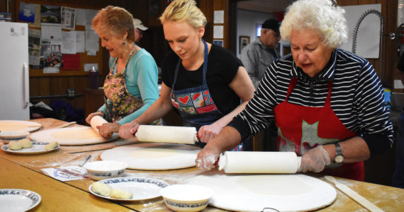 Matthew N. Wells / The Daily World
Janie Valentine, Andrea Krause and Barbara Jorgenson, from left, work up some sweat equity as they lovingly flatten lefse — a product of potato, flour, water, milk and butter — in preparation for the Sons of Norway Grays Harbor dinner on Sunday afternoon, Jan. 15, at the nonprofit organization’s building at 717 Randall St. in Aberdeen. The three women were part of a group of about 20 people on Tuesday who were making the Norwegian flatbread.