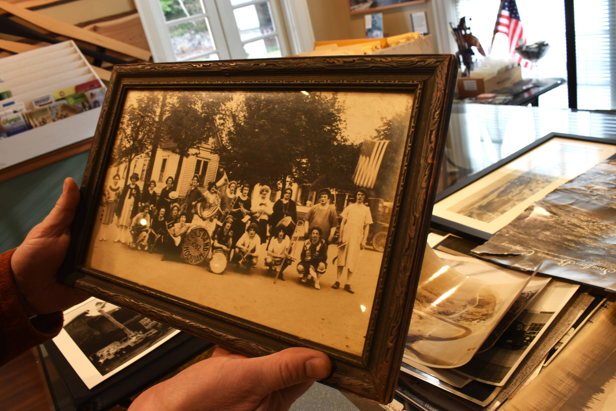 In an undated photo, Hoquiam Elks 1082 Band shows its camaraderie with a fun group photo. This is one of the pieces Polson Museum received from a former resident’s private collection. While the museum is closed until April, the museum’s work is not done as staff and volunteers work hard restoring, cataloguing and sprucing up exhibits. (Matthew N. Wells / The Daily World)