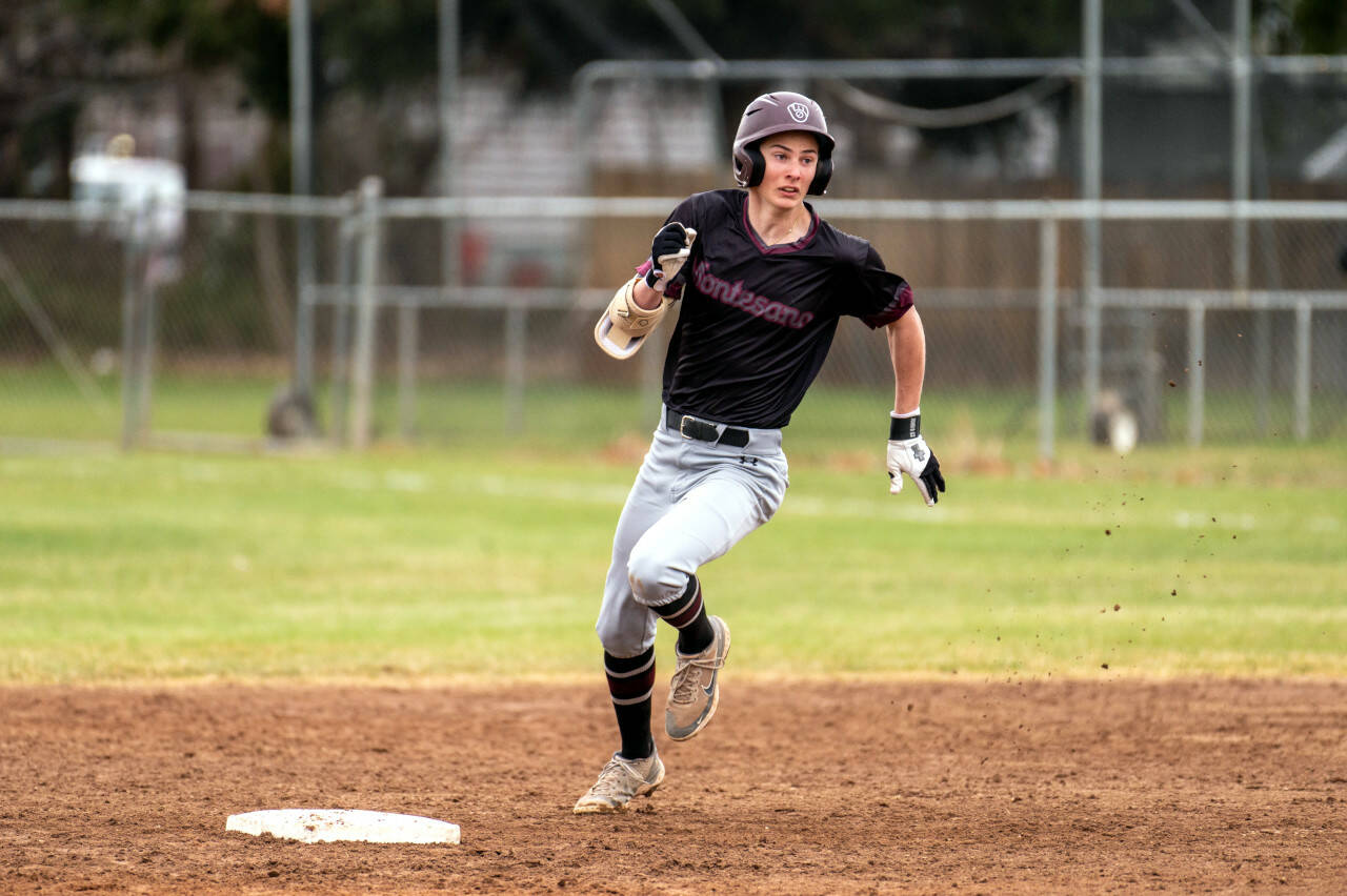 PHOTO BY FOREST WORGUM Montesano shortstop Bode Poler rounds second during a doubleheader against Naches Valley on Saturday in Naches.