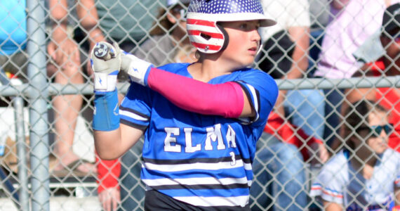 RYAN SPARKS | THE DAILY WORLD
Elma's Jackson Bucy smacks a base hit during a 14-4 victory over Seattle Central in the Little League Senior State Tournament on Tuesday in Elma.