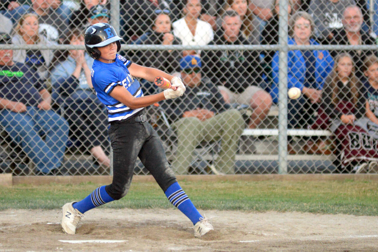 RYAN SPARKS | THE DAILY WORLD Elma’s Brysten Crawford belts a single during a 14-0 loss to Bellevue National at the Little League Intermediate State Tournament on Thursday in Elma.