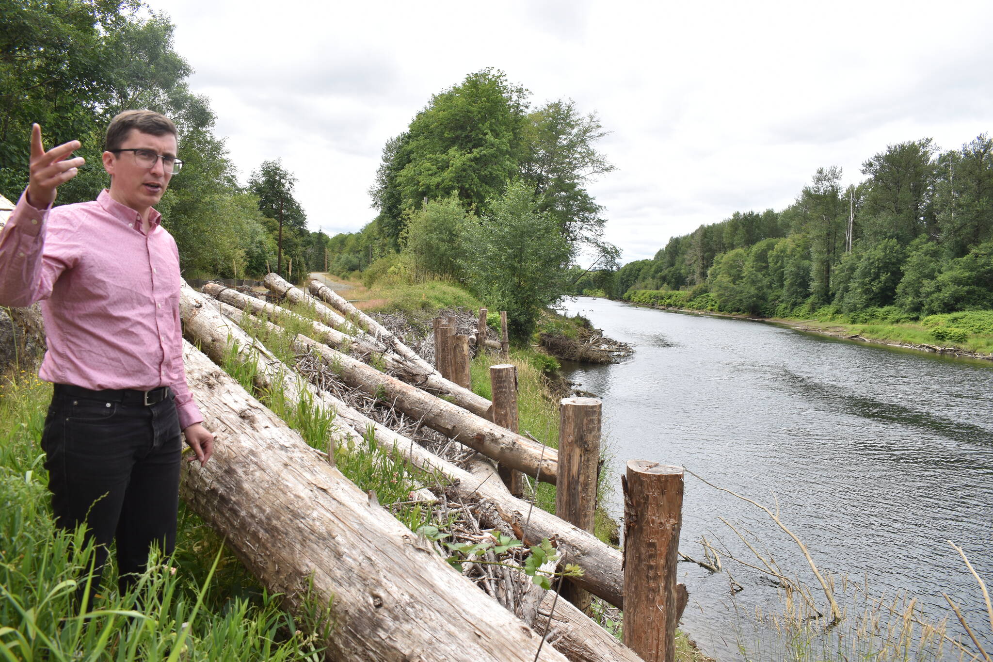 Clayton Franke / The Daily World
Kris Koski, engineer for the Port of Grays Harbor, stands next to an erosion-reduction project in the Satsop Business Park on July 10. The first phase, completed last year after a severe flooding season, was designed to last one year. The next phase is currently in construction.