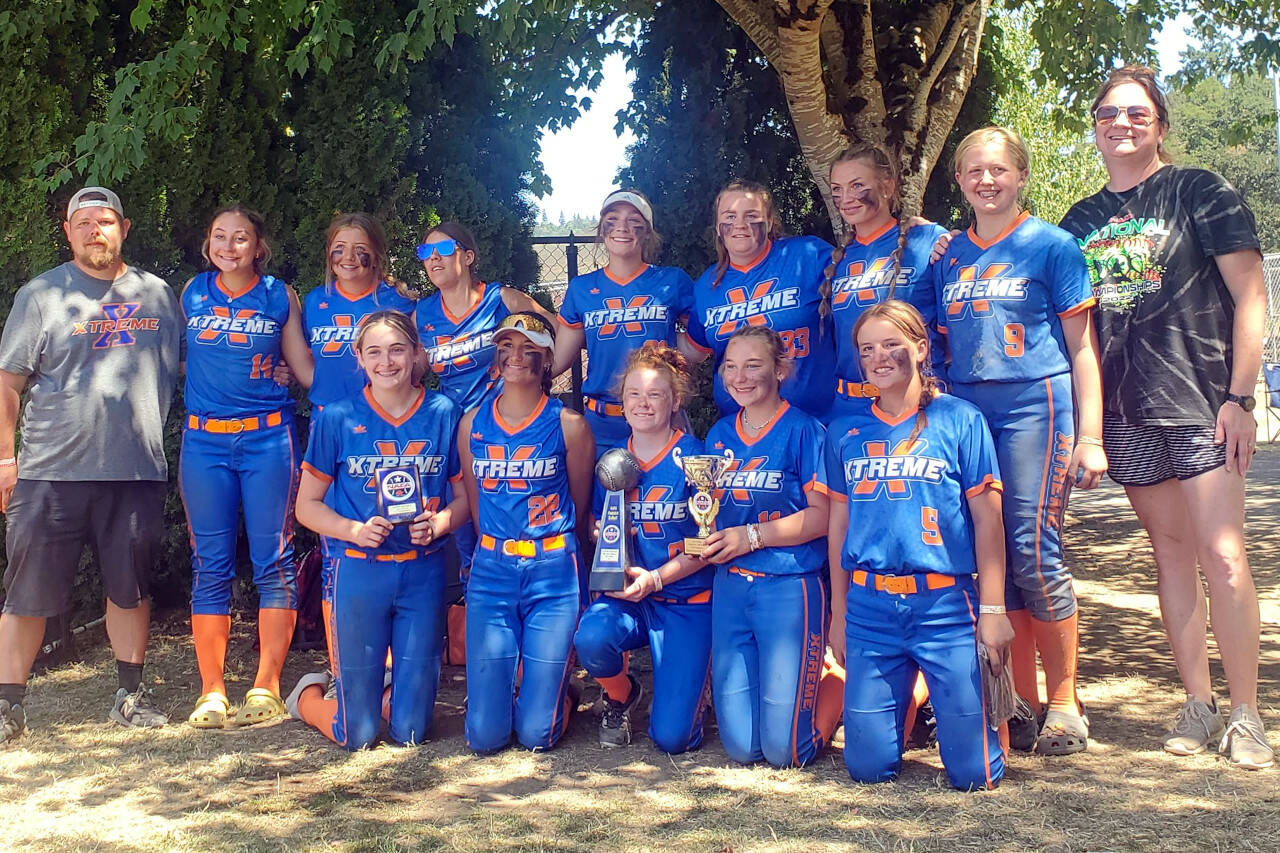 SUBMITTED PHOTO The Elma Xtreme Fastpitch 14U team placed fourth and won the Sportsmanship Award at the NAFA Summer Nationals on Sunday in Newberg, Oregon. Pictured are (front row, from left): Violet Prince, Kailani Gorum, Abigail McBride, Annika Luellen, Hana Lessard. Top row: Head coach Russell Luellen, Hadley Lowery, Makenna Horst, Jordan Trudell, Jaylynn Milton, Olivia McBride, Lynsee Bednarik, Cheyanna Kohn, assistant coach Jayme McBride.