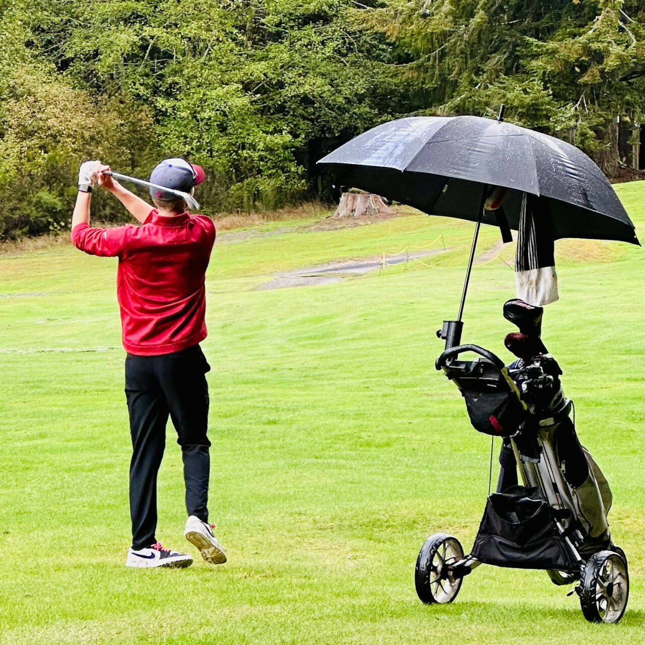 SUBMITTED PHOTO Hoquiam’s Riley Montoure shoots from the fairway during a Senior Night match against Montesano on Tuesday, Oct. 10, at Highland Golf Course.