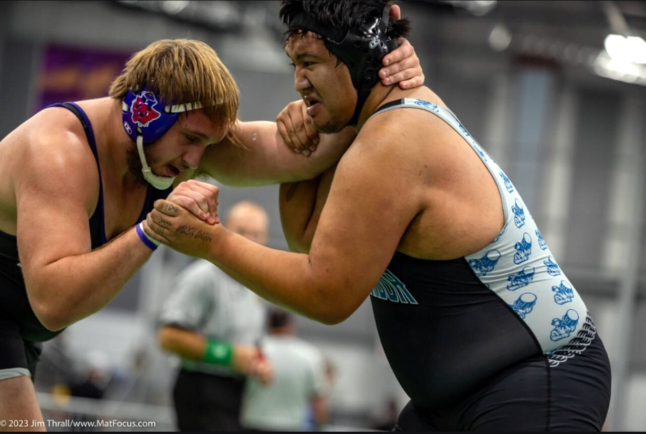 PHOTO COURTESY OF MATFOCUS.COM Grays Harbor College’s Rocco Clark, right, competes during the GHC Open on Sunday in Hoquiam.