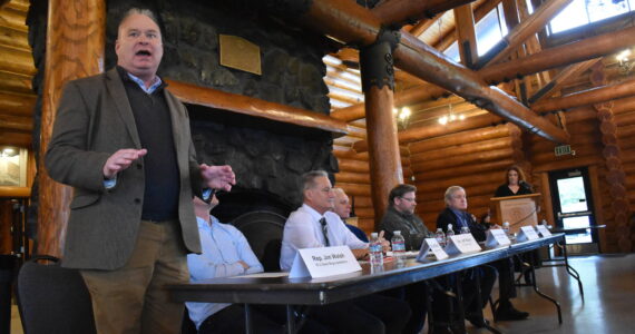 Rep. Jim Walsh, R-Aberdeen, left, speaks during a legislative "send-off" event hosted by Greater Grays Harbor, Inc on Friday, Jan. 5. All six state legislators from the 19th and 24th districts were in attendance. (Clayton Franke / The Daily World)