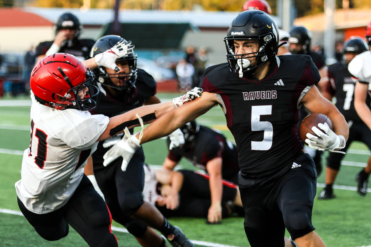 PHOTO BY LARRY BALE Raymond-South Bend senior Ferrill Johnson (5), seen here in a file photo, was named to the WSFCA 2B All-State Team as a kick returner.