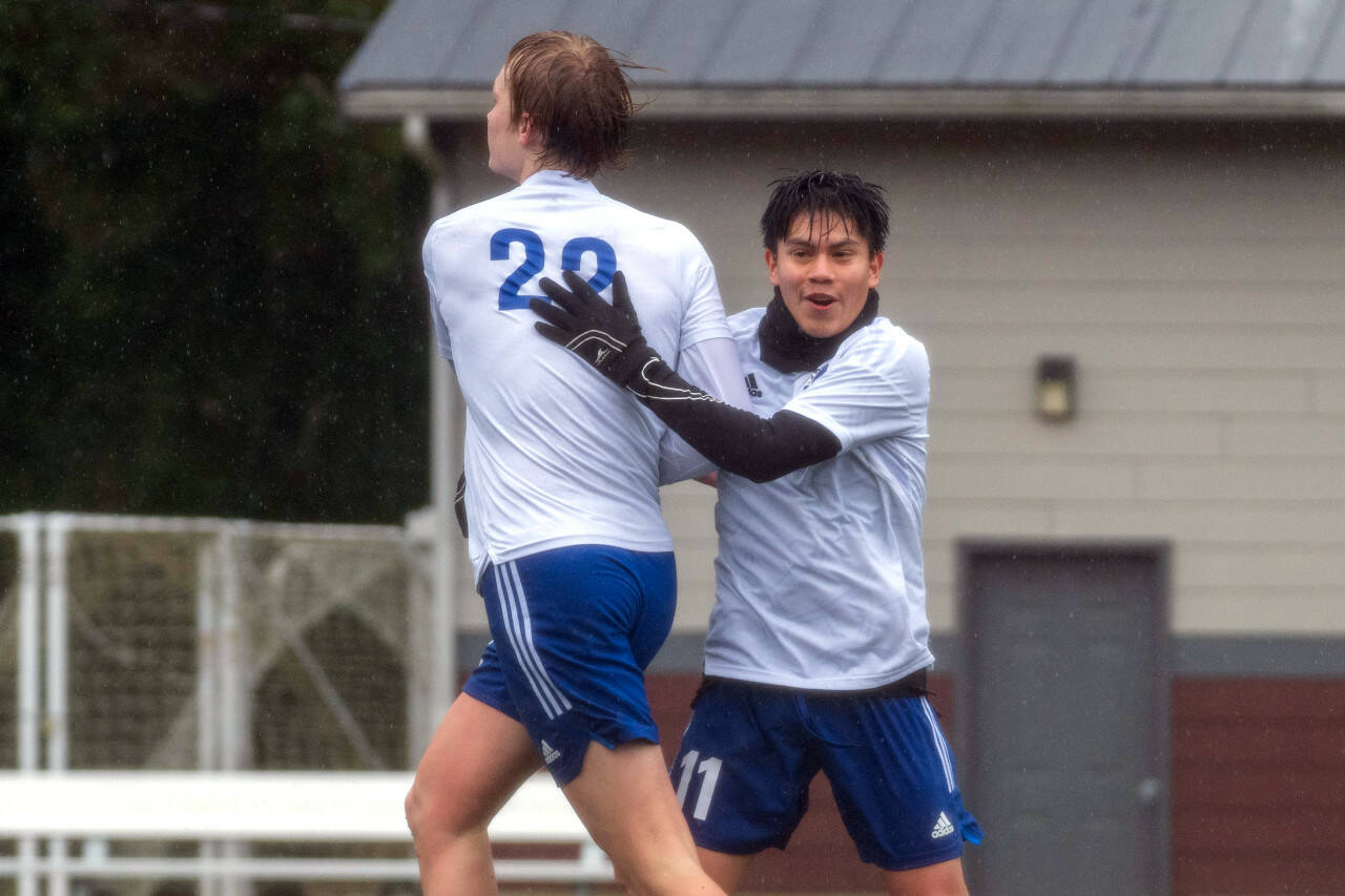 PHOTO BY FOREST WORGUM Elma’s Cason Seaberg, left, and Luis Torres, seen here in a file photo from March 9, helped the Eagles to a 3-0 win over Raymond-South Bend on Friday in Elma.