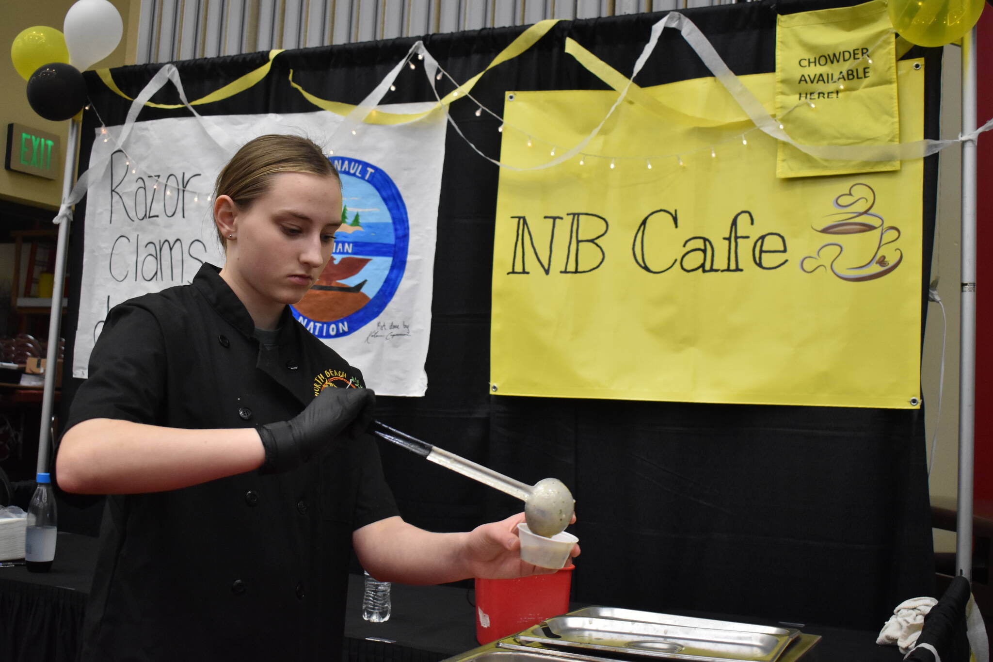 Clayton Franke / The Daily World
Arabella Porter, a ninth-grader in the North Beach culinary program, serves razor clam chowder samples March 16 during the Razor Clam Festival and Seafood Extravaganza at the Ocean Shores Convention Center. Students from the program cooked more than 30 gallons of chowder and competed in this year’s competition.