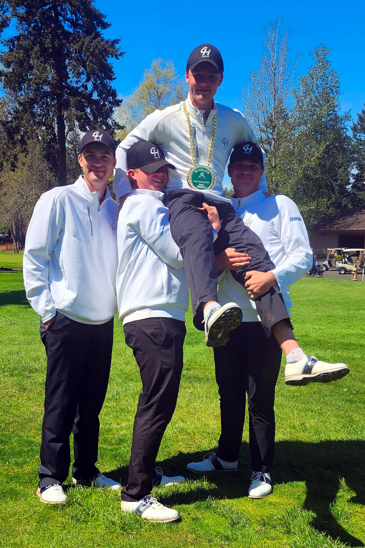 SUBMITTED PHOTO The Grays Harbor College men’s golf team of (from left) Cole Wasson, Hayden Hayes, Rasmus Tamker and Brett Wasson celebrate a victory at an NWAC league match on Monday at the Oakbrook Golf Course in Tacoma.