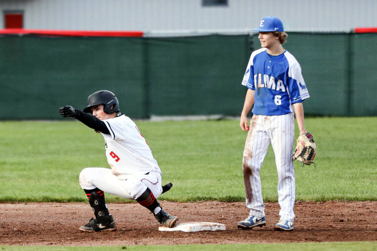 ZACH MARTIN | THE CHRONICLE Elma infielder TJ Dunlap (6) looks on as Tenino’s Will Feltus (9) celebrates after hitting a game-tying double during a 1A Evergreen League game on Tuesday in Tenino.