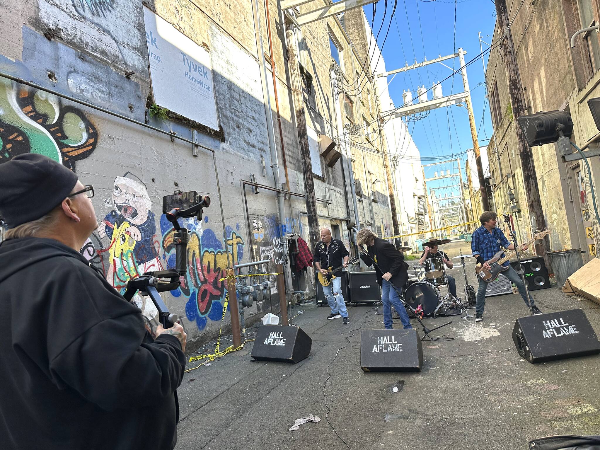 Amy Moyer of Moyer Multi Media LLC.
Rick Moyer, left, films Hall Aflame’s music video for “The Same Gutter.” The song is the fifth track on the band’s new album Amplifire.