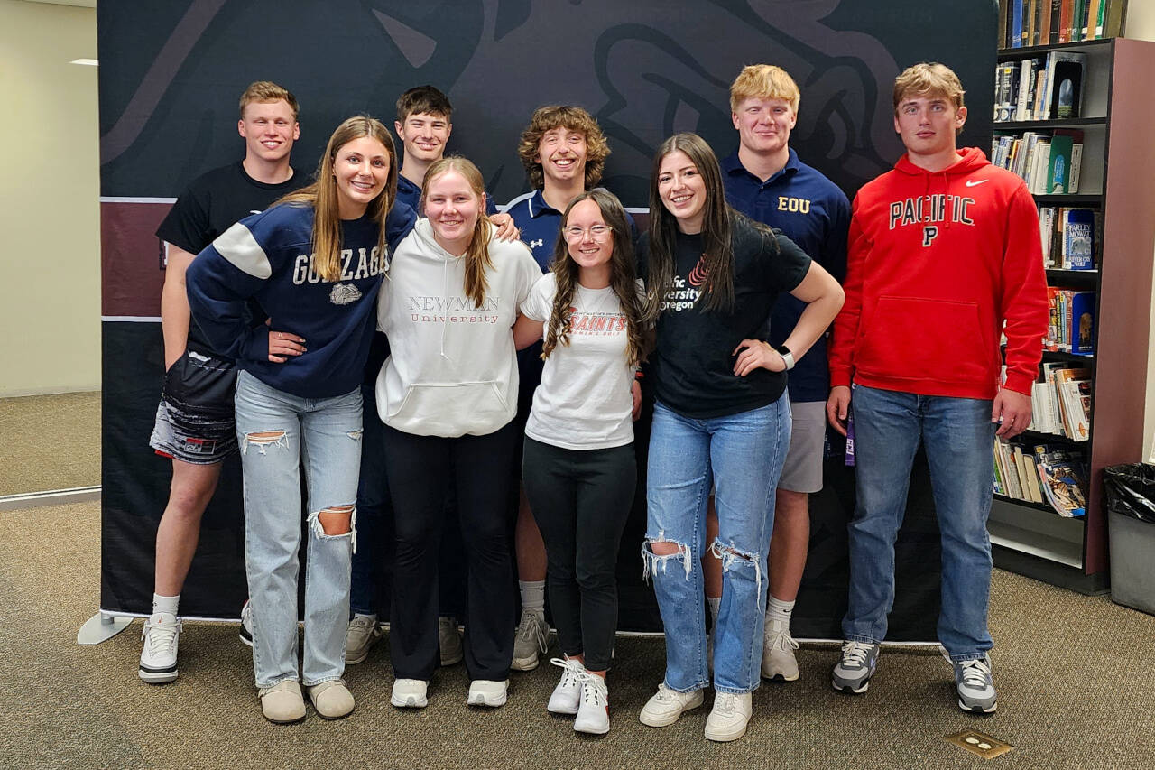 RYAN SPARKS | THE DAILY WORLD Montesano High School honored it future collegiate athletes with a signing ceremony on Wednesday. Pictured are (front row, from left) Mikayla Stanfield (Gonzaga, soccer), Reghann Fairbairn (Newman University, softball), Hailey Blancas (St. Martin’s University, golf) and Kya Roundtree (Pacific University, wrestling). Back row (from left): Tyce Peterson (Pacific University, basketball), Bode Poler (Gonzaga University, baseball), Skylar Bove (Big Bend Community College, baseball), Cam Taylor (Eastern Oregon University, football), Tyler Johansen (Pacific University, football).