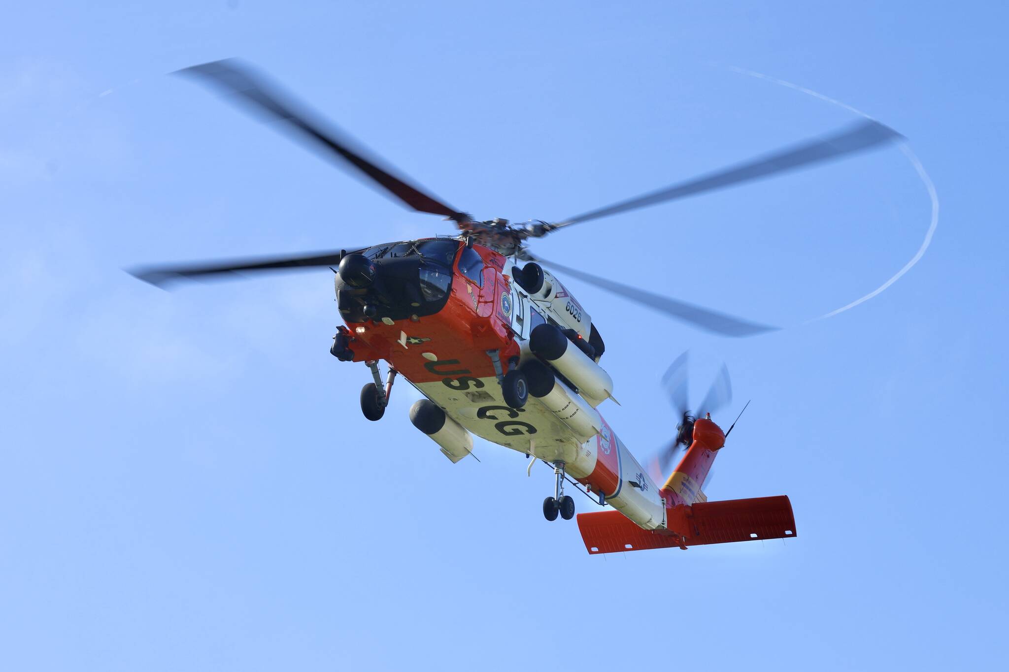 A Coast Guard MH-60 Jayhawk lands at the Ocosta School District’s football field on Tuesday. (Michael S. Lockett / The Daily World)