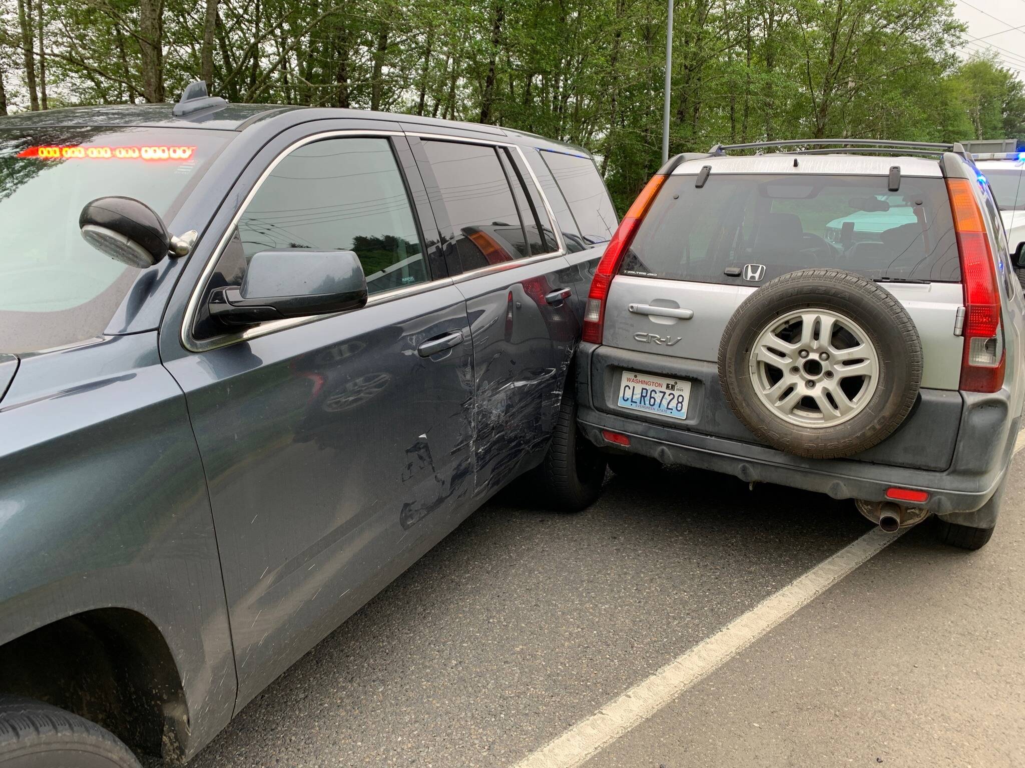 Sheriff’s deputies pursued and stopped a vehicle driven by a man wanted for multiple warrants on Thursday morning. (Courtesy photo / GHSO)