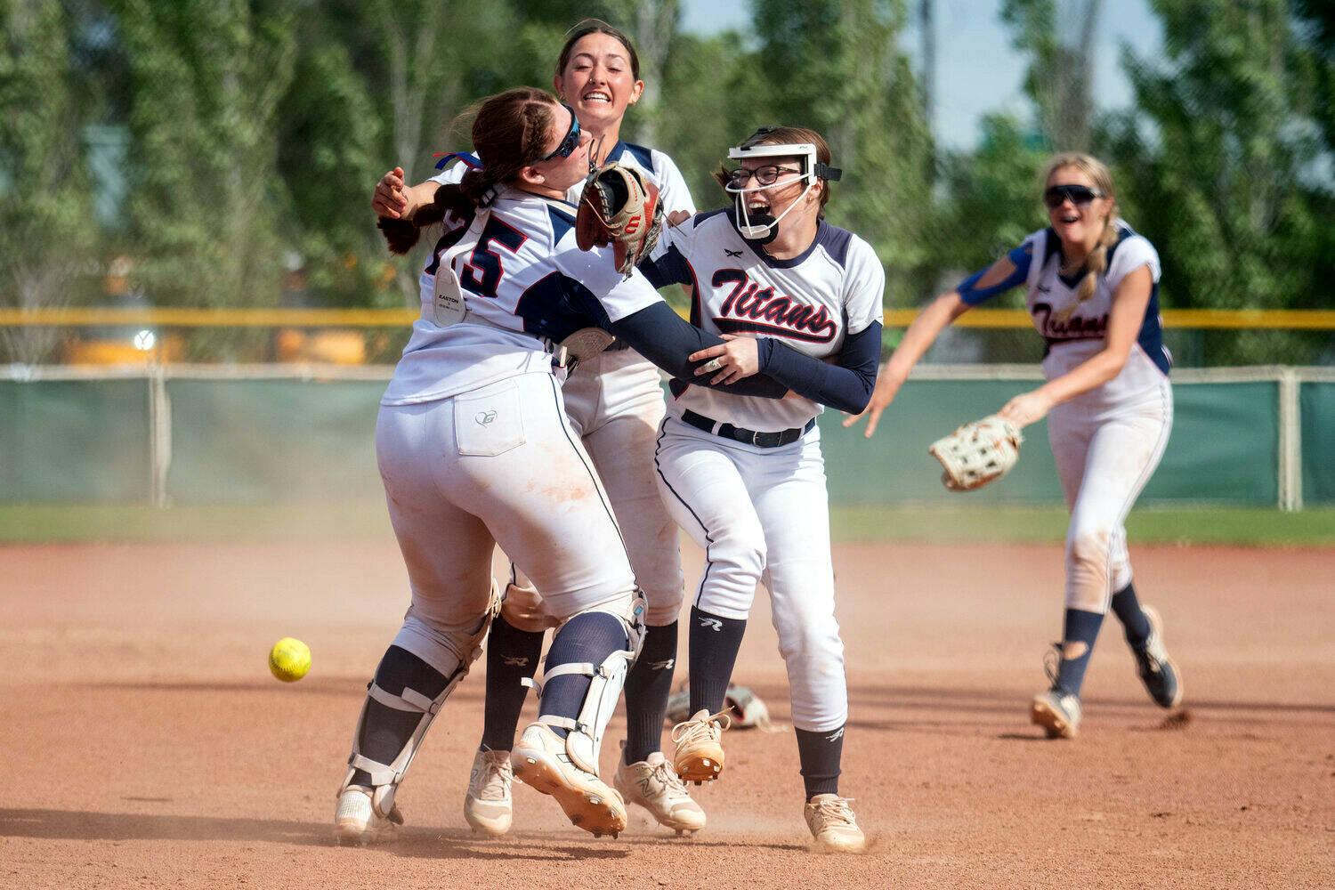 KODY CHRISTEN | THE CHRONICLE Pe Ell-Willapa Valley’s (from left) Sophia Milanowski, Rilyn Channell and Lauren Emery celebrate after winning the 2B State third-place game with a win over Kittitas on Saturday at the Gateway Sports Complex in Yakima.