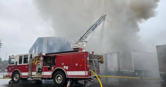 Firefighters work to extinguish a trash fire early Sunday morning. (GHFD2)