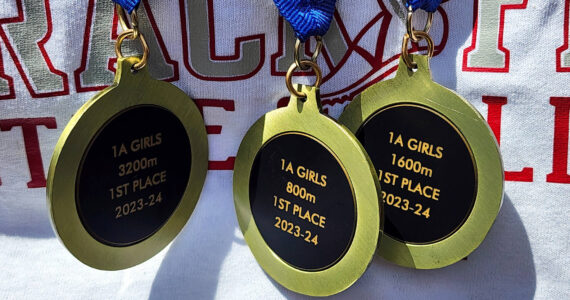 SUBMITTED PHOTO Hoquiam senior Jane Roloff’s 1A State Championship medals for winning the girls 800, 1600 and 3200-meter races May 23-25.