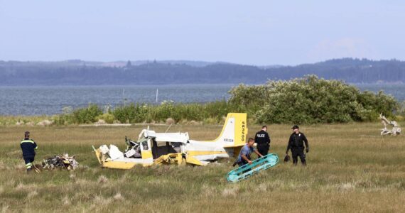 A plane crashed at Ocean Shores Municipal Airport on Saturday, June 8, from an unknown cause, injuring two. (Michael S. Lockett / The Daily World)