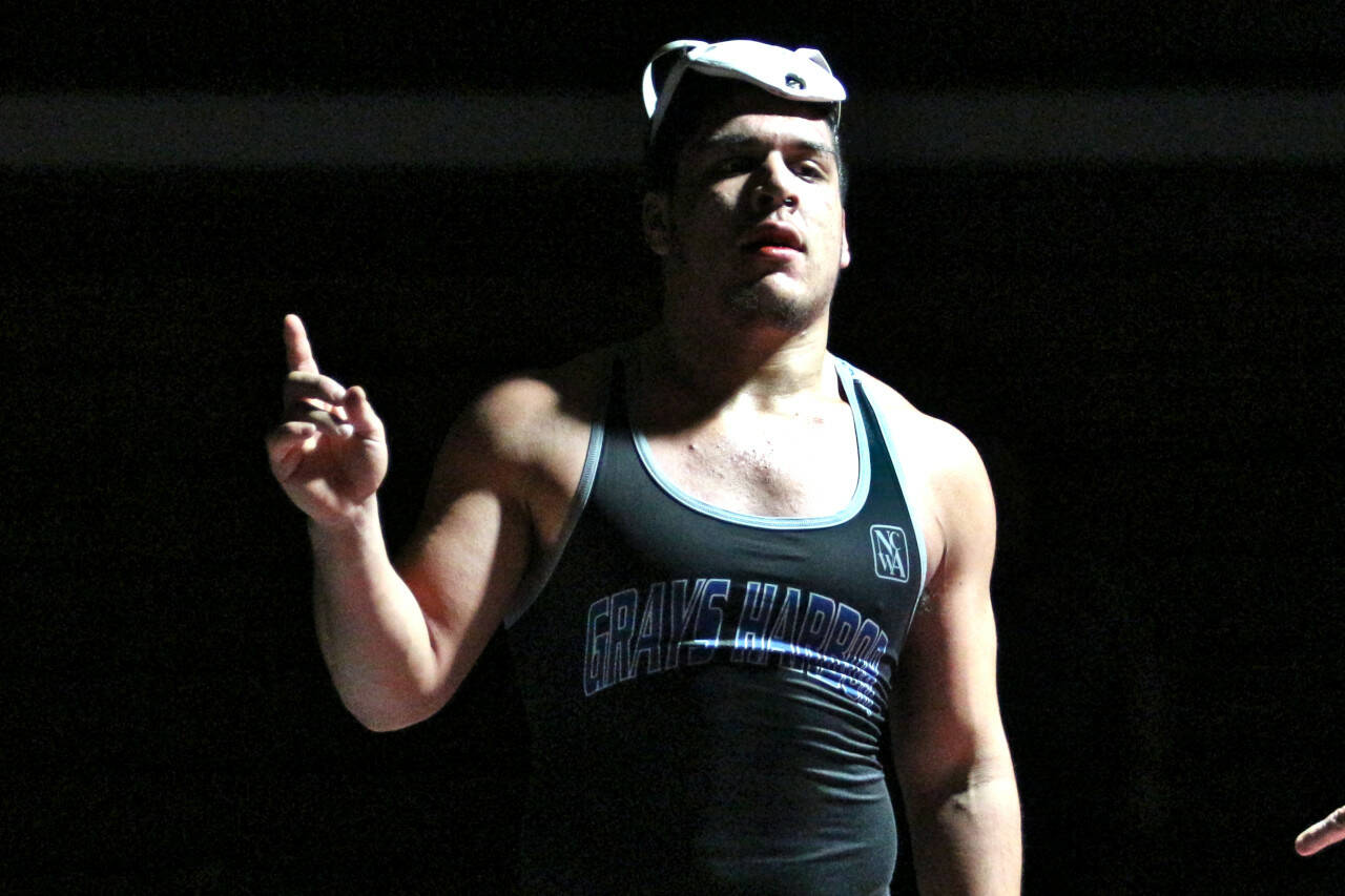 DAILY WORLD FILE PHOTO: Grays Harbor College wrestler Josh Luna won his weight class at a tournament March 2 in Hoquiam. The college decided Monday to suspend the men's wrestling and golf programs.