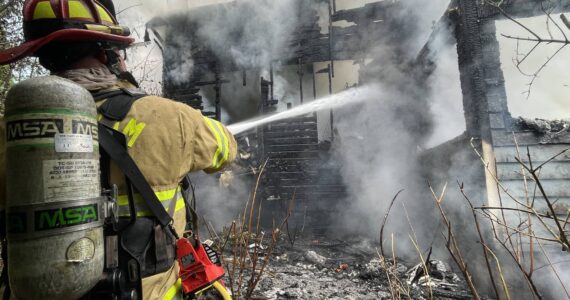 Michael S. Lockett / The Daily World
Fire tore through a Hoquiam residence on Tuesday evening.