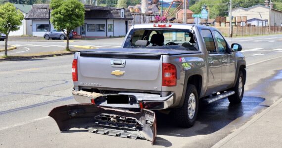 Damage is evident to a vehicle struck by gunfire in a road rage-related incident near McCleary, including the bumper of the suspect vehicle caught on the trailer hitch. (Michael S. Lockett / The Daily World)