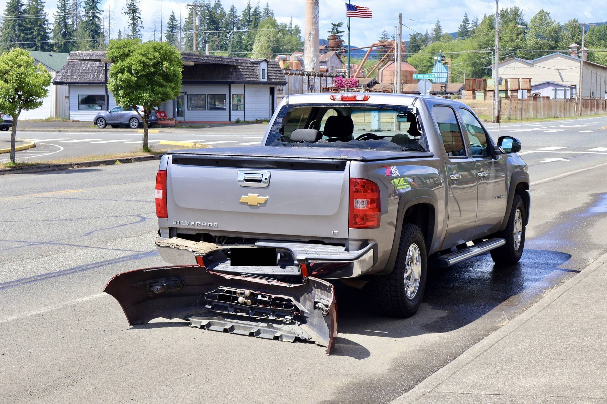 Damage is evident to a vehicle struck by gunfire in a road rage-related incident near McCleary, including the bumper of the suspect vehicle caught on the trailer hitch. (Michael S. Lockett / The Daily World)