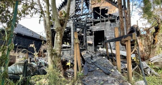 Michael S. Lockett / The Daily World
A vacant house in Hoquiam was destroyed Sunday night in a fire that damaged a neighboring house.